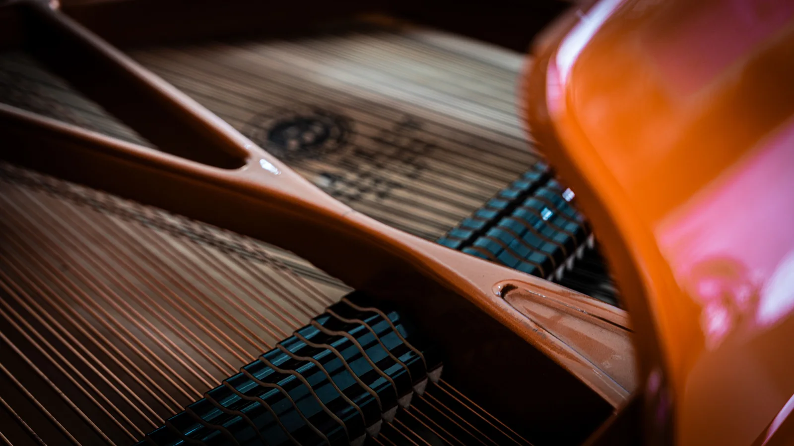 Strings, dampers and the frame inside a grand piano